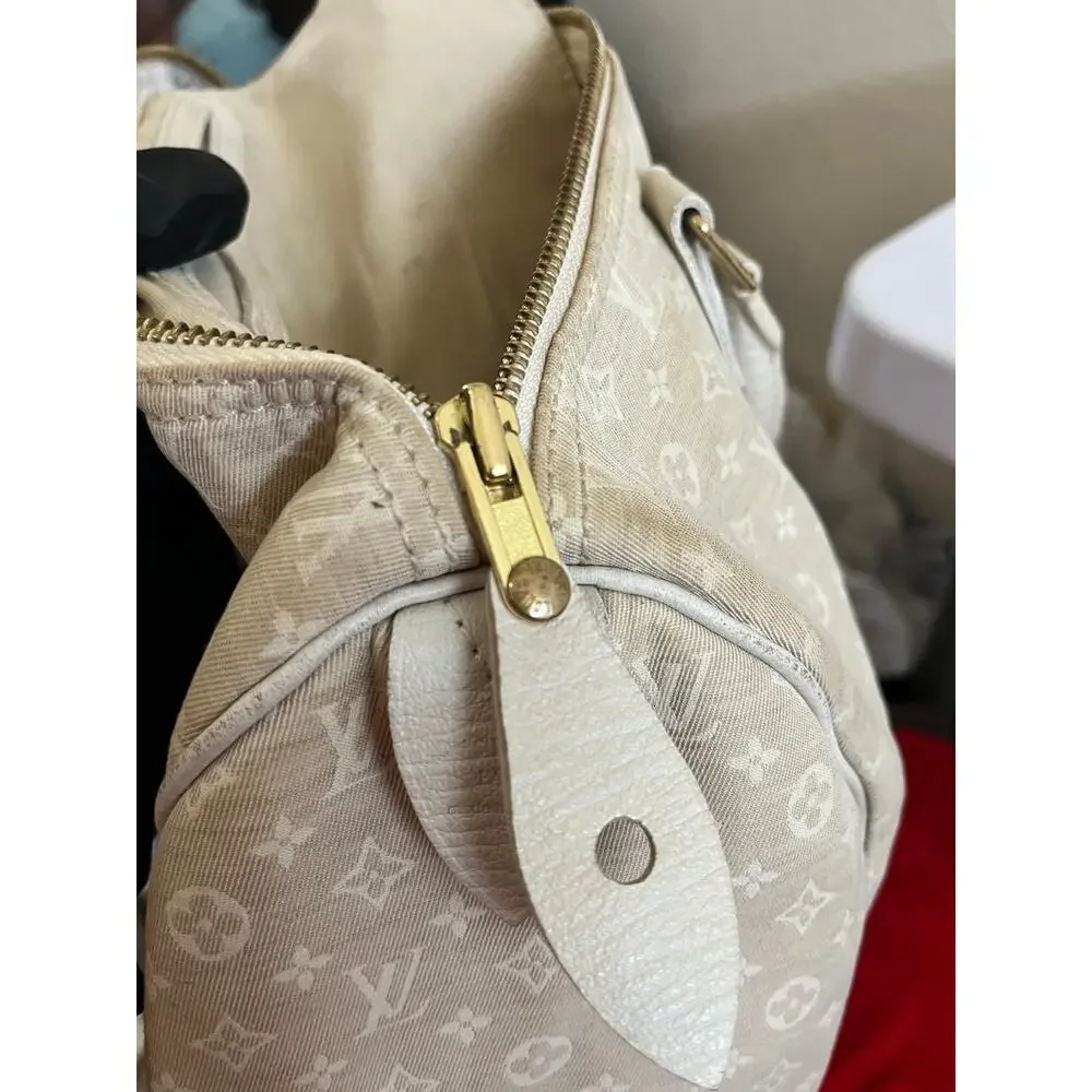 Louis Vuitton off white monogram cloth speedy 30
